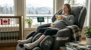 A pregnant woman enjoying a wellness moment with tea and a pregnancy safe massage chair in a Canadian home during winter.