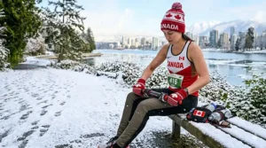 Illustration of a runner using a recovery stick indoors after a cold winter run in Toronto.