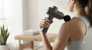Ergonomic handle design of a smart massage gun providing a comfortable grip for hard-to-reach areas.