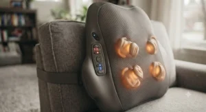 Demonstration of adjustable heat settings and massage nodes on a modern electric back massager for chronic pain.