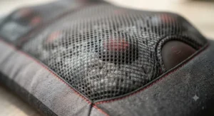 Detailed view of the breathable mesh fabric and durable cushioning material on a modern heated back massage cushion.