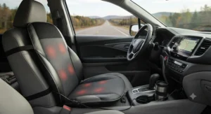 A portable heated back massage cushion placed on a vehicle seat, ideal for long-distance commutes across Canadian highways.